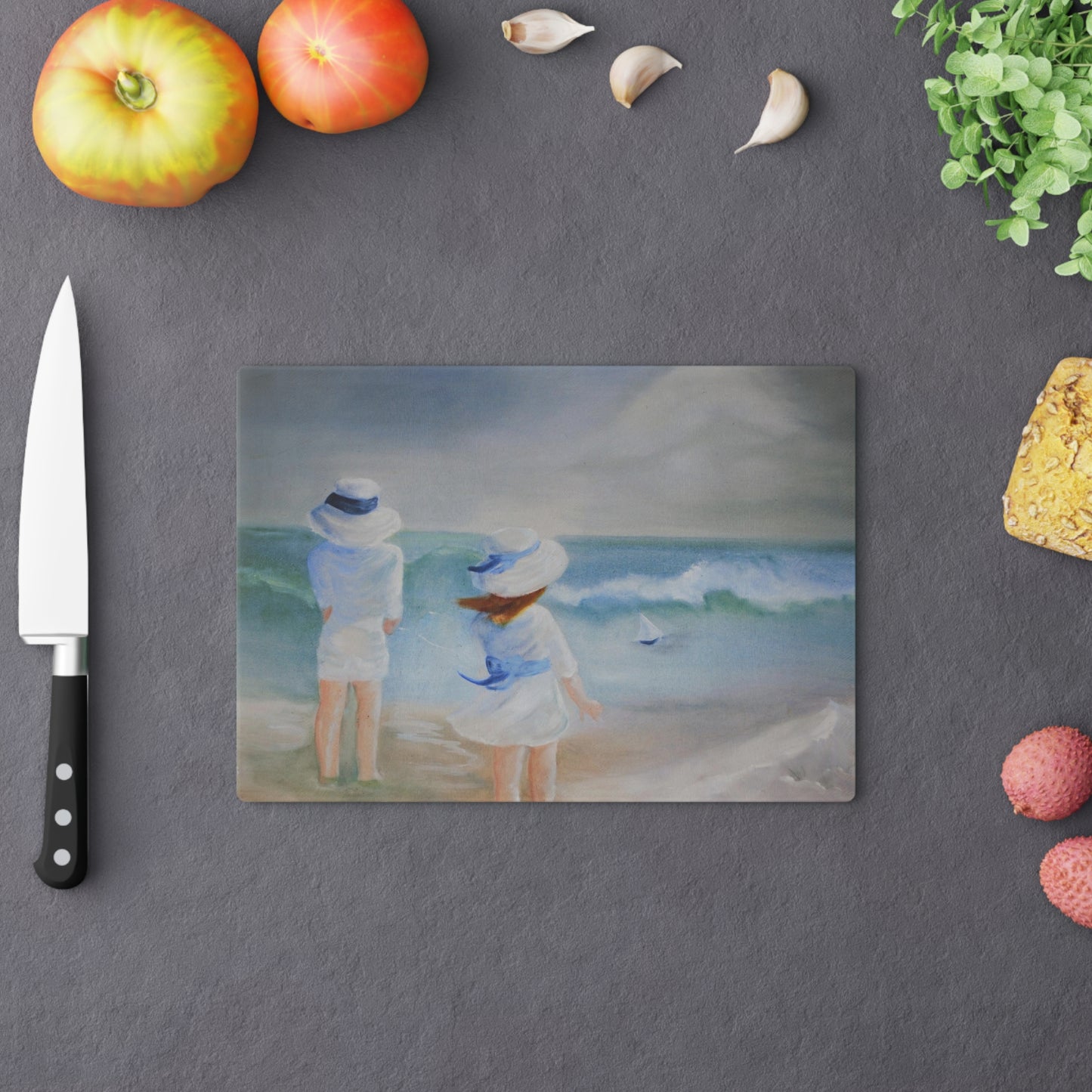 Dodie's Boy and Girl at the Beach Glass Cutting Board